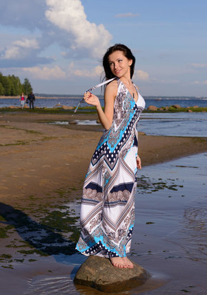 18 year old girl Agnes uncovers her perky tits as she gets completely naked